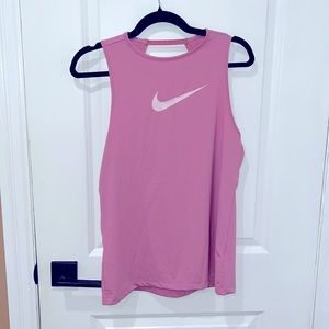 NWOT Nike Pro Women’s Tank Top. Pink/Fuchsia. Dri-Fit. Cut out back. Size small.